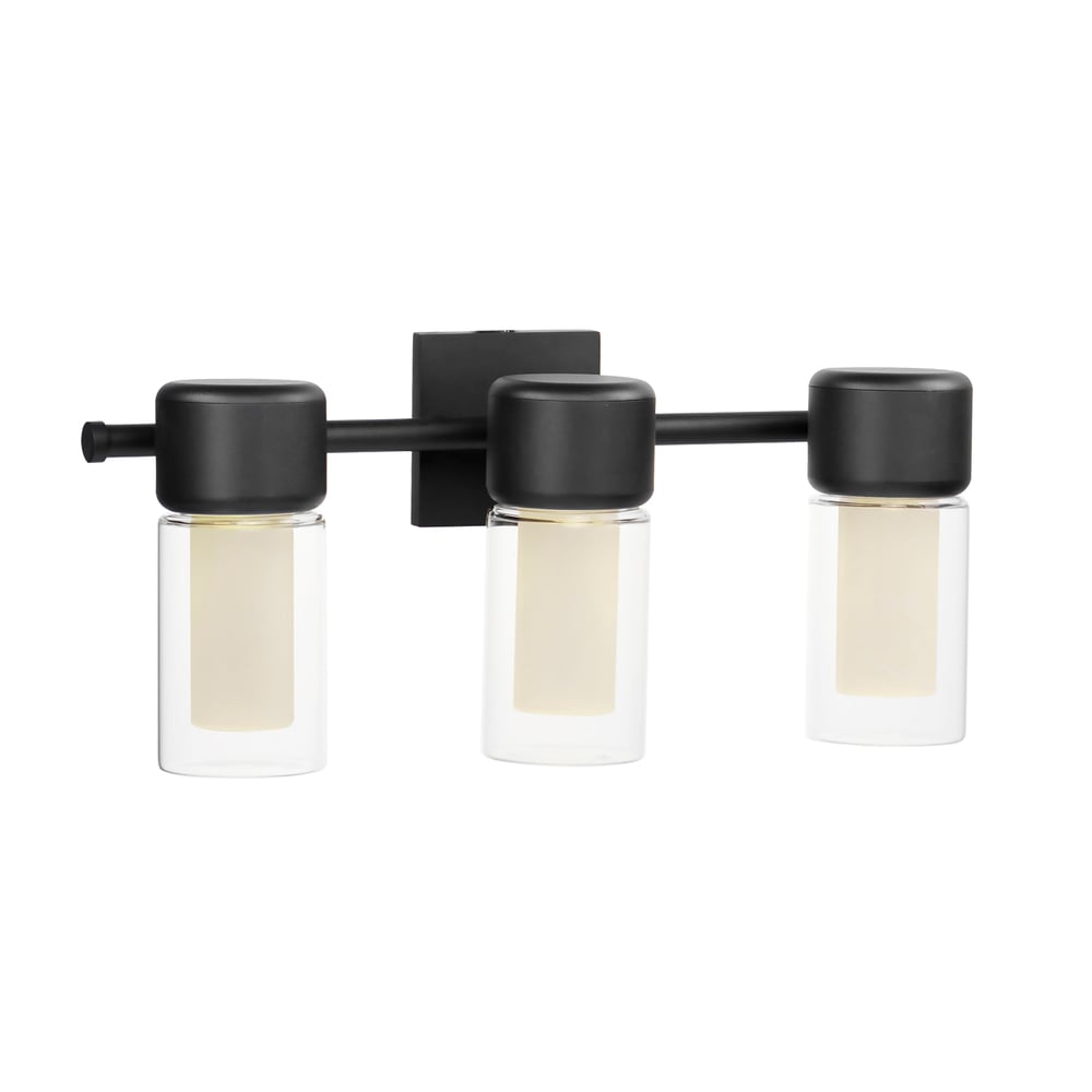 ET2 Dram LED Bathroom Sconce with a sleek, modern design featuring a polished chrome finish, illuminating a bathroom setting with soft, warm light.