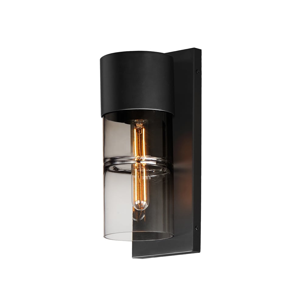 ET2 Smokestack Outdoor Wall Mount in black finish with a sleek steel and glass design, illuminating a garden path with warm light.