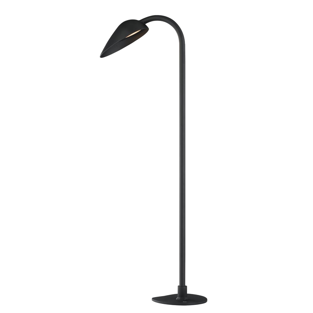 ET2 Marsh Outdoor Path Light in Black Aluminum finish, illuminating a garden path with its sleek, modern design and soft, ambient lighting.