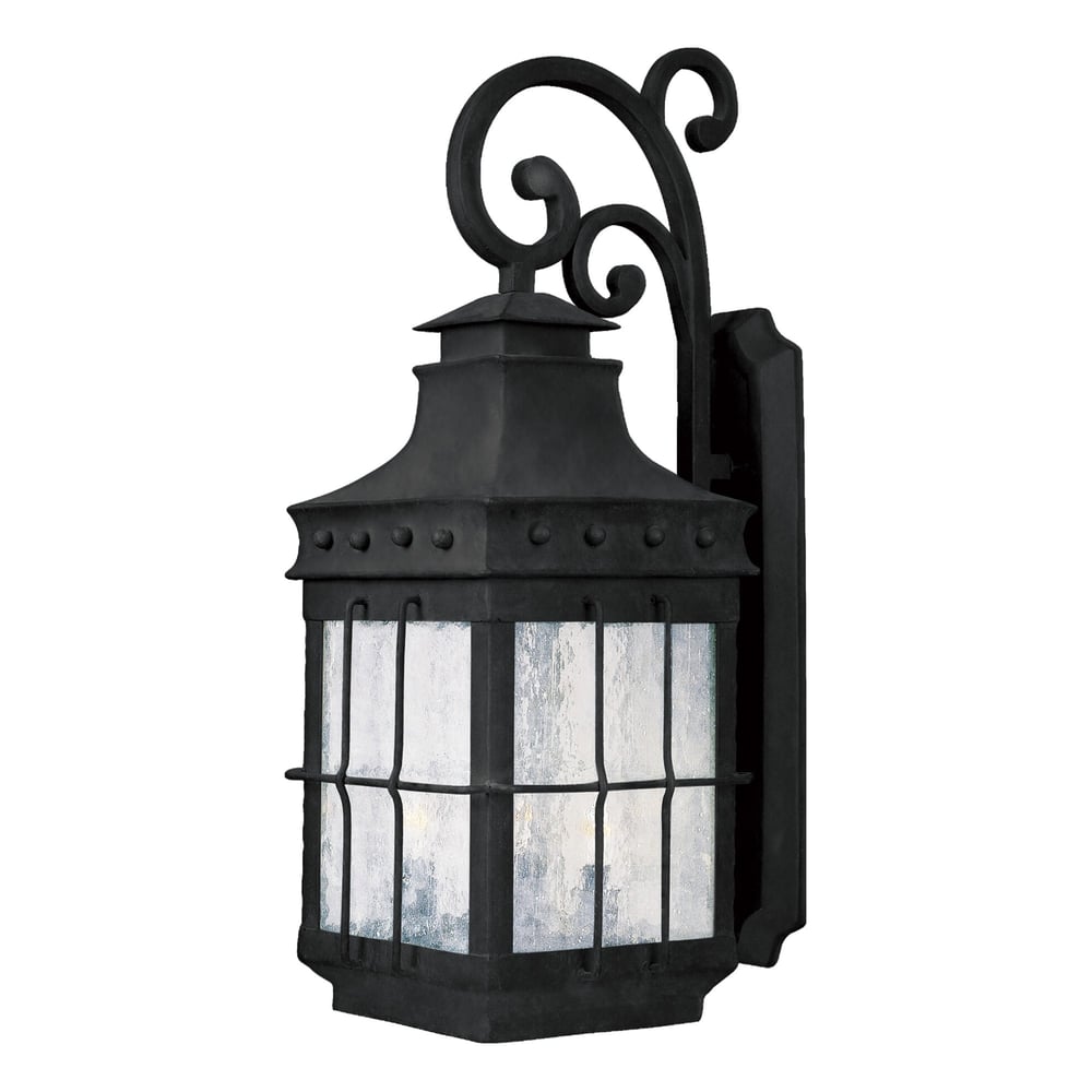Maxim Lighting Nantucket Outdoor Wall Light in Country Forge finish, featuring a steel and glass design, mounted on an exterior wall.