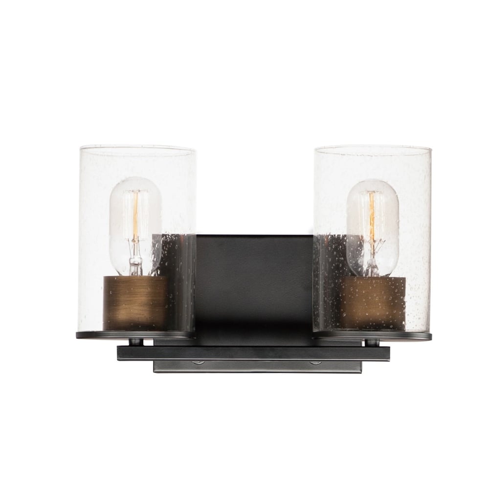 Maxim Lighting Sleek Bath Vanity in Antique Brass with Black finish, featuring a modern design with steel and glass elements, mounted on a bathroom wall.