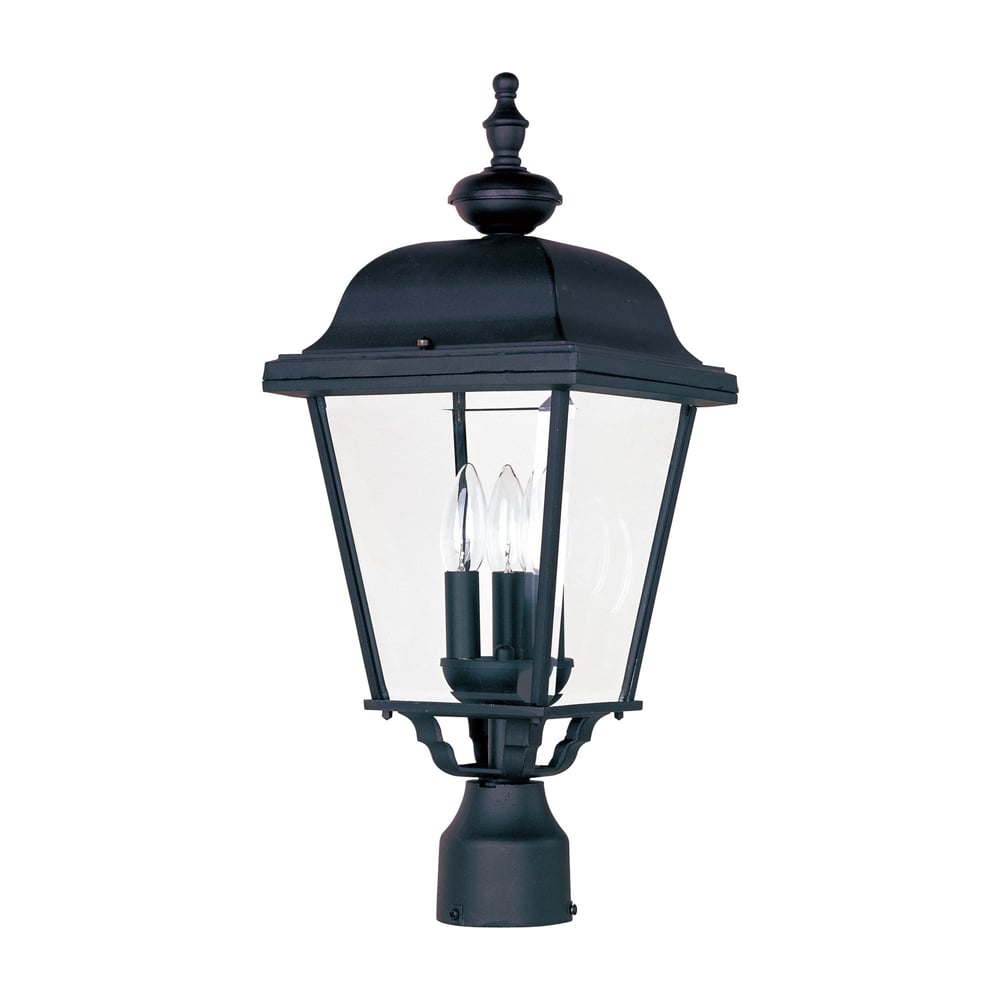 Maxim Lighting Builder Cast 3-Light Outdoor Pole/Post Lantern with a classic design, featuring a black finish and clear glass panels illuminating a garden path.