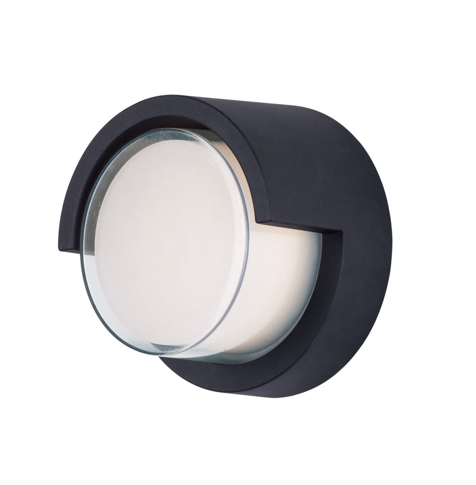Maxim Lighting Eyebrow Round Outdoor Wall Light with a sleek finish, illuminating a modern exterior with its curved design and soft glow.
