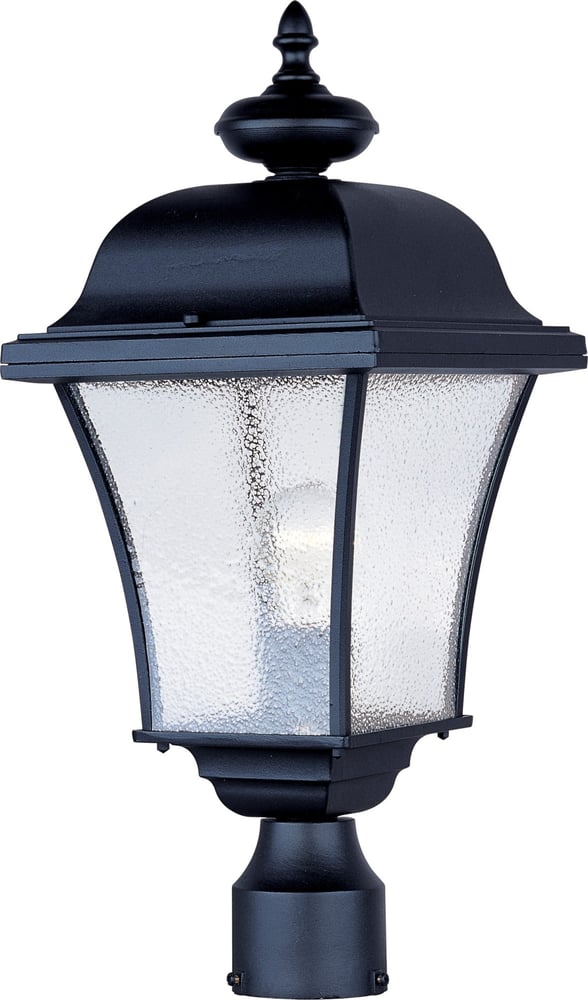 Maxim Lighting Senator Outdoor Post Light with a traditional design, featuring a black finish and clear glass panels, illuminating a garden pathway.