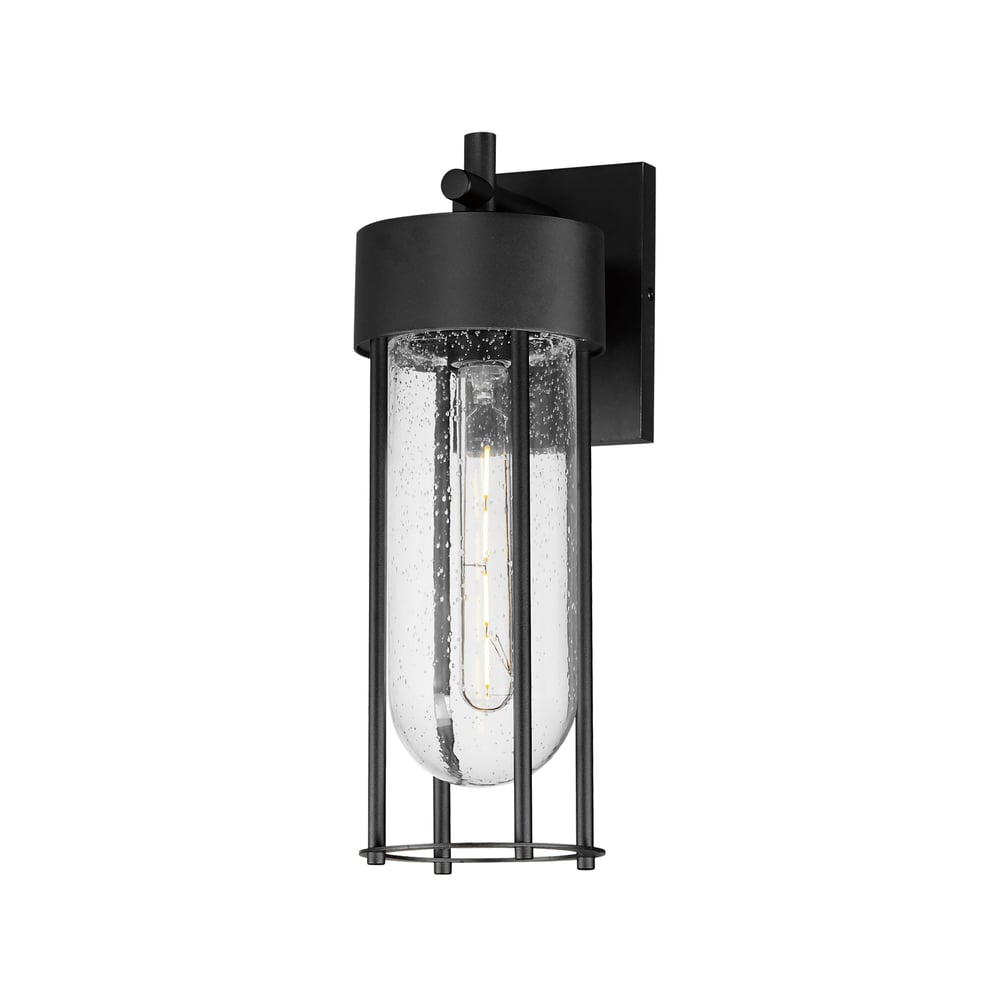 Maxim Lighting Millennial Outdoor Wall Sconce in black aluminum with glass shade, mounted on a brick wall, illuminating a patio area.