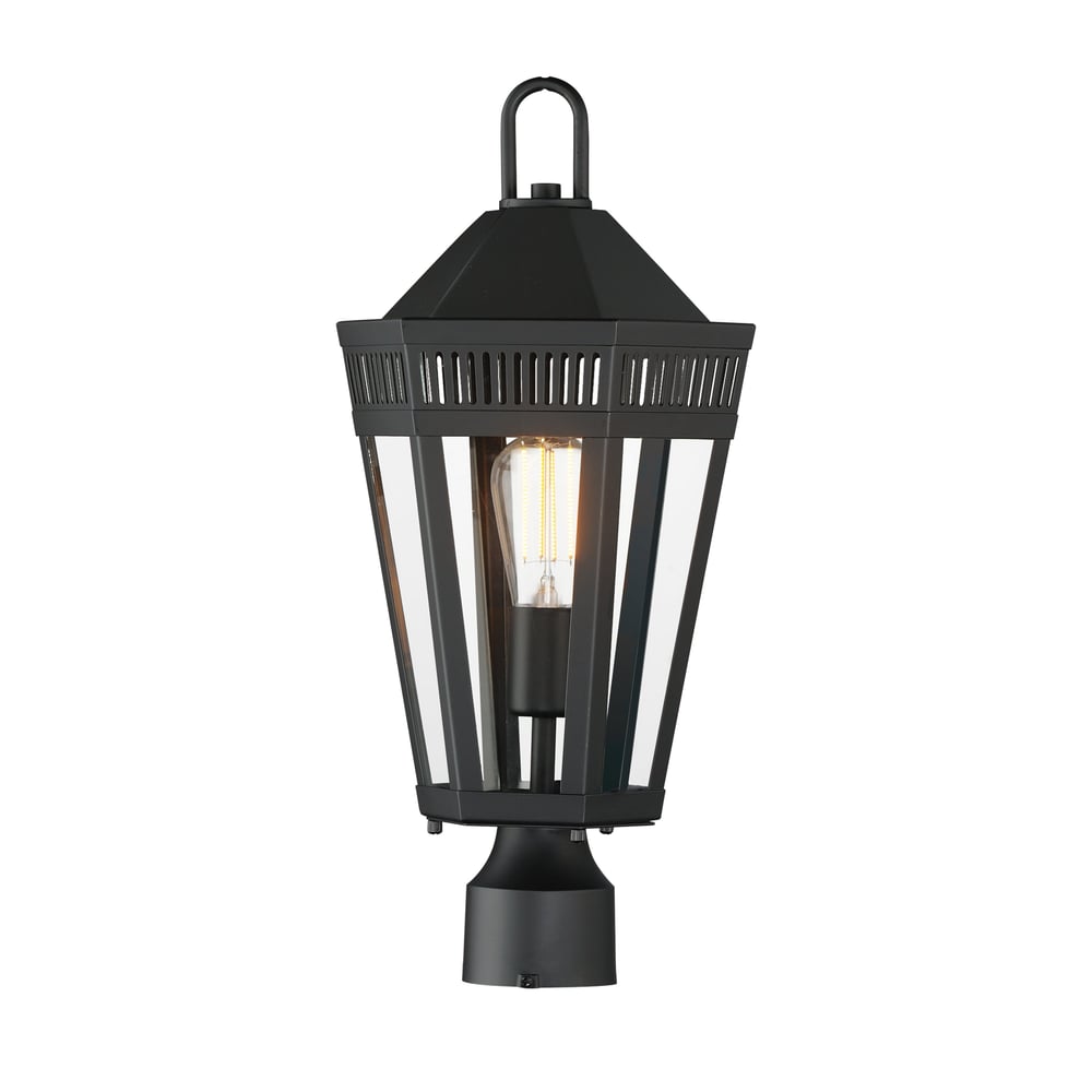 Maxim Lighting Oxford Outdoor Pier Light in black finish, featuring a sleek steel and glass design, illuminating an outdoor setting.