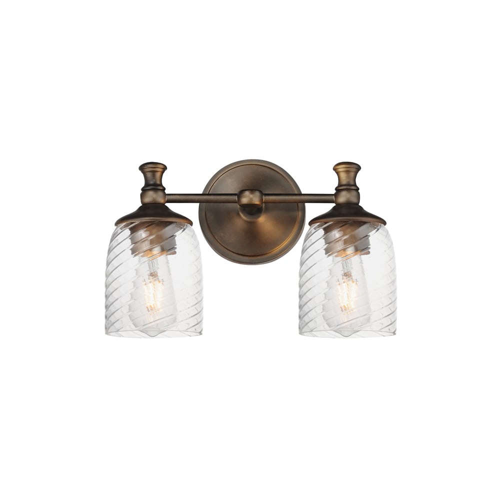 Maxim Lighting Swirl Bath Vanity with Antique Bronze finish, featuring a steel frame and swirling glass shades, elegantly illuminates a bathroom space.