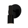 ET2 Handler Outdoor Spot Light in black finish, made of aluminium and PMMA, illuminating a garden path with a focused beam of light.