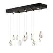 ET2 Pebble Linear Multi-Light Pendant featuring a sleek design in Steel with Black and Polished Gold accents, showcasing multiple hanging lights.