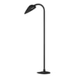 ET2 Marsh Outdoor Path Light in Black Aluminum finish, illuminating a garden path with its sleek, modern design and soft, ambient lighting.