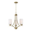 Maxim Lighting Deven Chandelier in Satin Brass finish, featuring a sleek design with steel frame and glass accents, elegantly hanging in a modern room.