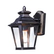 Maxim Lighting Knoxville Outdoor Wall Lantern in Bronze finish, featuring an elegant aluminum frame with clear glass panels, illuminating a warm glow.