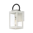 Maxim Lighting Nassau Vivex Outdoor Wall Sconce in White with Black finish, featuring a durable Steel frame and Glass panels, mounted on a wall.