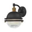 Maxim Lighting Portside Outdoor Wall Light in Oil Rubbed Bronze with Brass finish, made of Aluminum, mounted on a wall, illuminating the exterior.