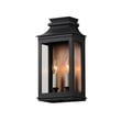 Maxim Lighting Savannah VX Outdoor Wall Sconce in Antique Copper with Black finish, made of durable Aluminum, mounted on a textured wall.