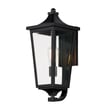 Maxim Lighting Sutton Place VX Outdoor Wall Sconce in Black finish, featuring a Steel frame and Glass panels, elegantly illuminates an exterior wall.