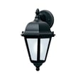 Maxim Lighting Westlake 65100 LED E26 Outdoor Wall Light in Black finish, made of Aluminum, mounted on a wall, illuminating a patio area.