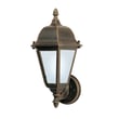 Maxim Lighting Westlake 65102 LED E26 Outdoor Wall Light in Rust Patina finish, made of Aluminum, mounted on an exterior wall.