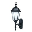 Maxim Lighting Westlake LED 1-Light Outdoor Wall Lantern in black aluminum finish, mounted on a brick wall, illuminating the area.