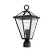 Maxim Lighting Prism Outdoor Post Light in Black finish, featuring a sleek steel frame with a geometric design, illuminating a garden path at dusk.