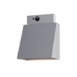 Maxim Lighting Pathfinder Outdoor Sconce in Aluminum finish, mounted on a wall, emitting a warm glow, highlighting its sleek, modern design.