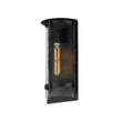 Maxim Lighting Foundry Outdoor Wall Sconce in Black finish, featuring a sleek steel frame with a clear glass shade, mounted on a wall.