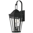 Maxim Lighting Oxford Outdoor Wall Sconce in black finish, featuring a sleek steel and glass design, elegantly mounted on an exterior wall.