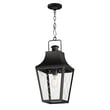 Maxim Lighting Storybook Outdoor Pendant in Black finish, featuring an Aluminum frame and Glass panels, hanging against a neutral background.