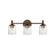 Maxim Lighting Swirl Bath Vanity with Antique Bronze finish, featuring a steel frame and swirling glass design, elegantly mounted on a bathroom wall.