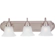 Maxim Lighting Essentials Bell Bathroom Vanity Light with Satin Nickel finish, featuring three steel and glass bell-shaped shades mounted on a sleek bar.