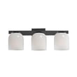 Maxim Lighting Scoop Bathroom Vanity Light with a sleek black steel frame and frosted glass shades, elegantly illuminating a modern bathroom setting.