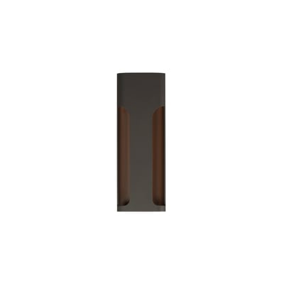 ET2 Maglev Outdoor Wall Mount in Architectural Bronze finish, made of Aluminum, elegantly illuminates a brick wall with soft, warm light.