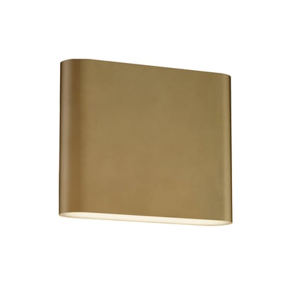 ET2 Spartan Wall Sconce in Natural Aged Brass finish, made of Aluminum, mounted on a wall, emitting warm light, with a sleek, modern design.