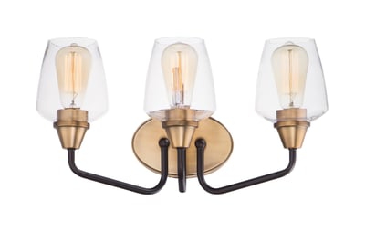 Maxim Lighting Goblet Bath Vanity featuring a Bronze with Antique Brass finish, crafted from Steel and Glass, elegantly illuminates a bathroom space.