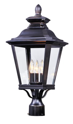Maxim Lighting Knoxville Outdoor Post Light in bronze finish, featuring an aluminum frame with a classic lantern design and clear glass panels.