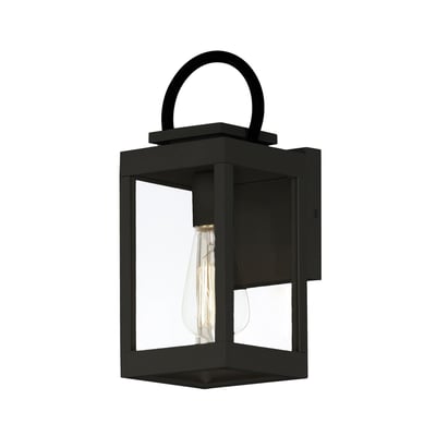Maxim Lighting Nassau Vivex Outdoor Wall Sconce in black finish, featuring a steel frame with glass panels, elegantly illuminates an exterior wall.