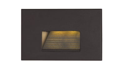 Image of Maxim Lighting's Path LED Step Light in a sleek black aluminum finish, mounted on a stairway, providing subtle and modern illumination.