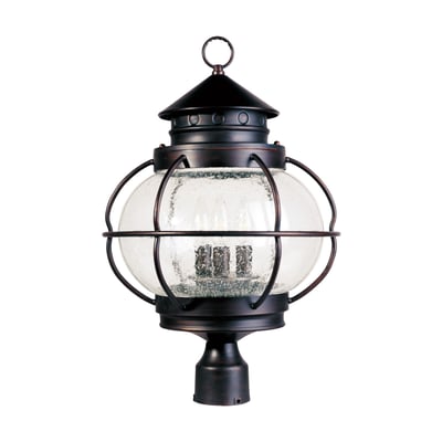 Maxim Lighting Portsmouth Outdoor Post Light in Oil Rubbed Bronze finish, crafted from durable Aluminum, stands elegantly against a clear sky backdrop.