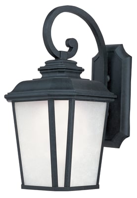 Maxim Lighting Radcliffe LED E26 Hanging Outdoor Wall Light in Black Oxide finish, made of Aluminum, illuminating a patio area."