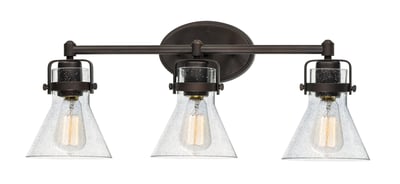 Maxim Lighting Seafarer Bathroom Vanity Light with Oil Rubbed Bronze finish, featuring steel and glass design elements, mounted on a bathroom wall.