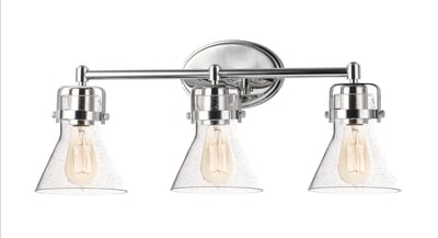 Maxim Lighting Seafarer Bathroom Vanity Light with polished chrome finish, featuring steel and glass construction, mounted above a bathroom mirror.