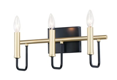 Maxim Lighting Sullivan Bathroom Vanity Light in Steel, featuring a Black with Gold finish, mounted above a mirror in a modern bathroom."