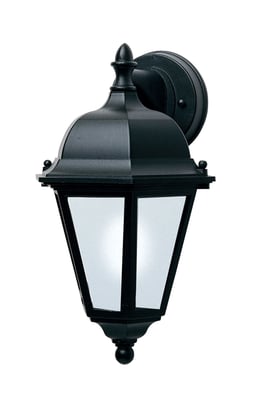 Maxim Lighting Westlake 65100 LED E26 Outdoor Wall Light in Black finish, made of Aluminum, mounted on a wall, illuminating a patio area.