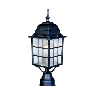Maxim Lighting North Church Outdoor Post Light with a classic design, featuring a black finish and clear glass panels, illuminating a garden pathway.
