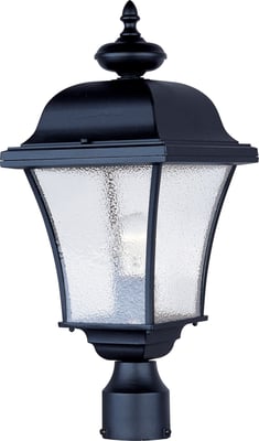 Maxim Lighting Senator Outdoor Post Light with a traditional design, featuring a black finish and clear glass panels, illuminating a garden pathway.