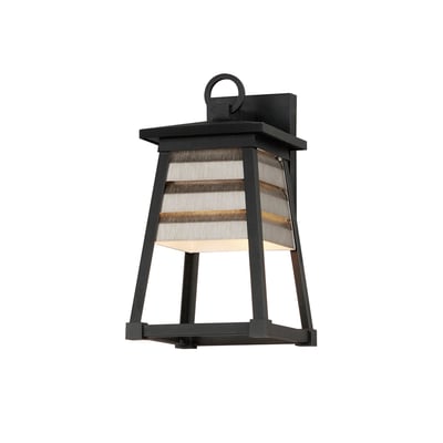 Maxim Lighting Shutters Outdoor Wall Sconce in Weathered Zinc with Black finish, made of EPMM Aluminum, mounted on a brick wall, illuminating the area.