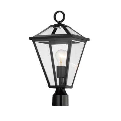 Maxim Lighting Prism Outdoor Post Light in Black finish, featuring a sleek steel frame with a geometric design, illuminating a garden path at dusk.