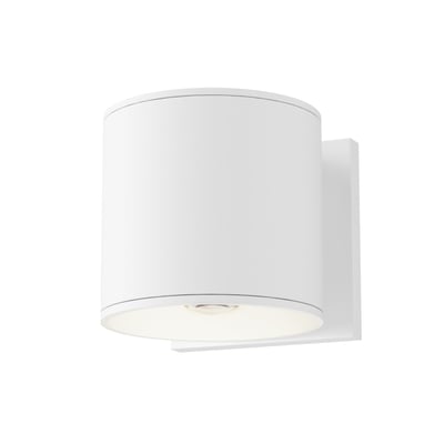 Maxim Lighting Stout Indoor/Outdoor Wall Sconce with a white aluminum finish and glass shade, mounted on a wall, illuminating the surrounding area.