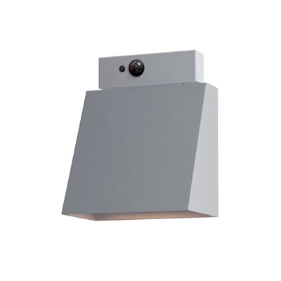 Maxim Lighting Pathfinder Outdoor Sconce in Aluminum finish, mounted on a wall, emitting a warm glow, highlighting its sleek, modern design.