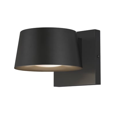 Maxim Lighting Gateway Outdoor Wall Sconce in Black finish, featuring a sleek polycarbonate design, mounted on a brick wall, illuminating the area.